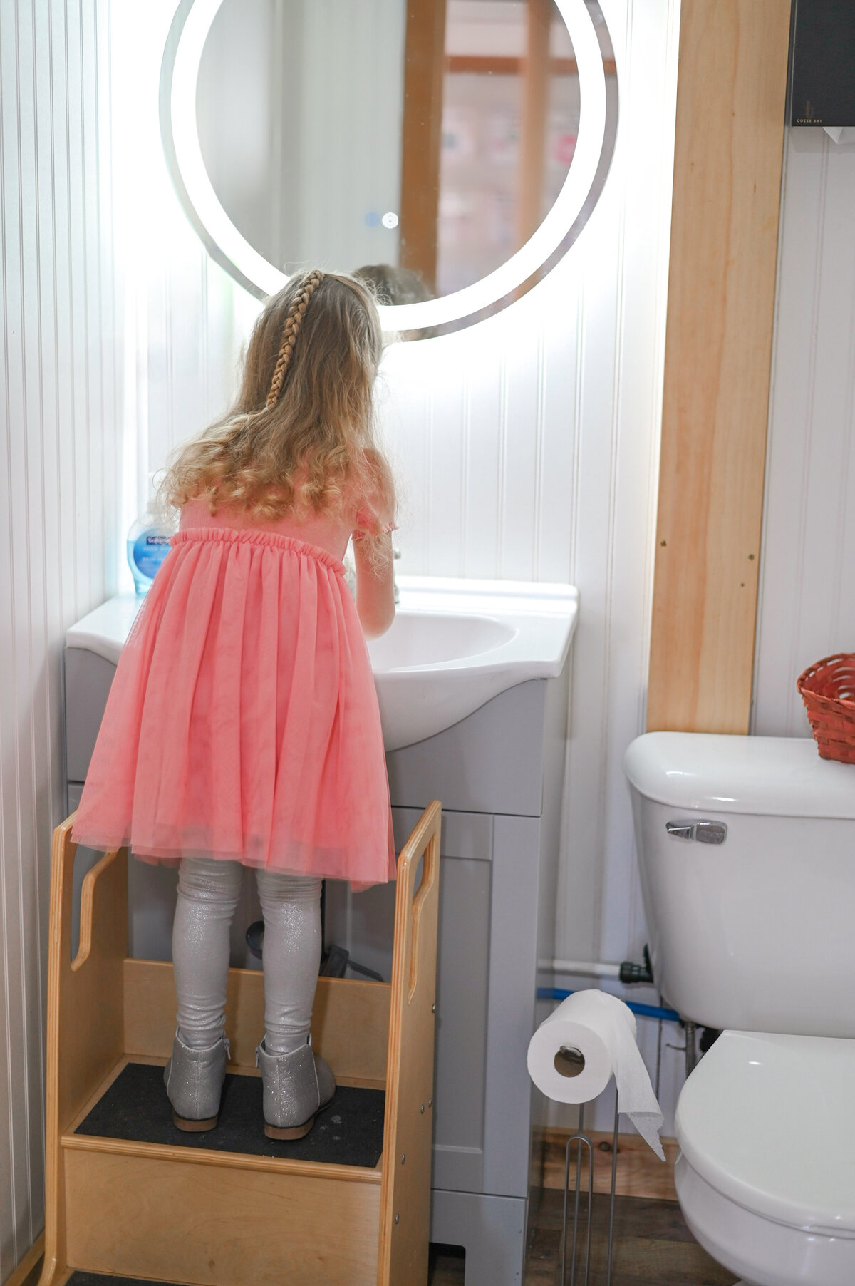 Student independently washing hands at House of Parker Preschool Gorham Maine 