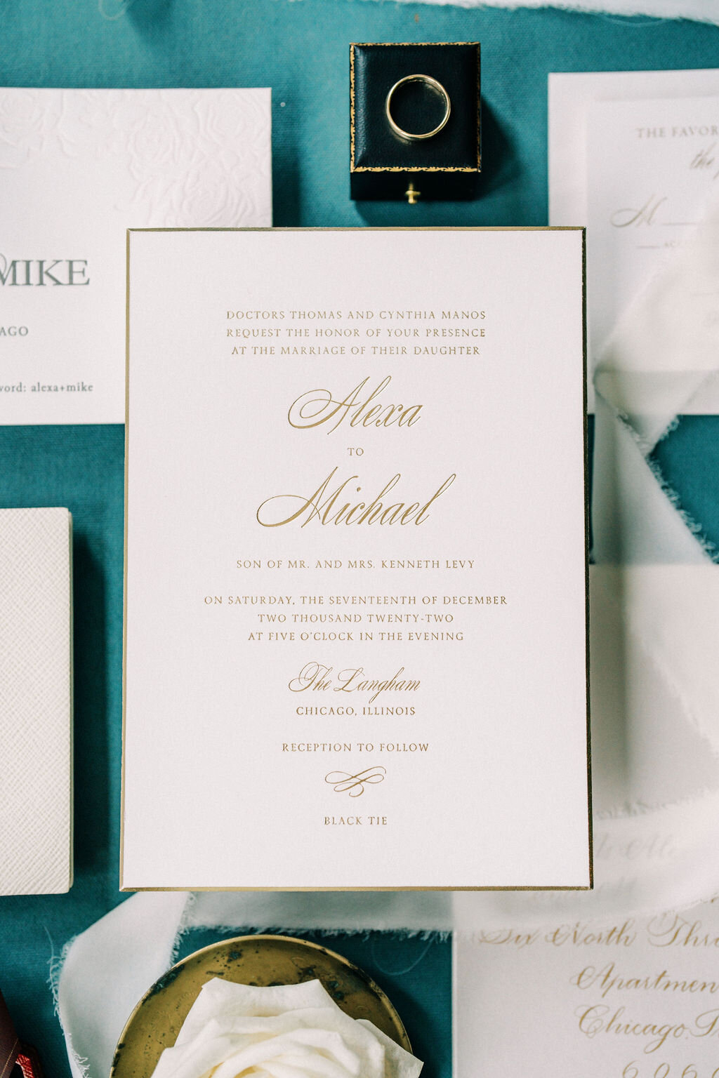 Up close photo of the wedding invitation at the Langham.