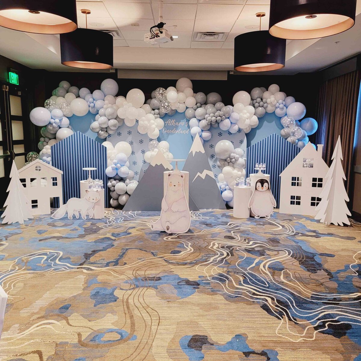 The serene charm of a Blue and White Antarctic Event setup. The sophisticated and cool ambiance of our expertly crafted balloon artistry, creating a unique and memorable atmosphere.