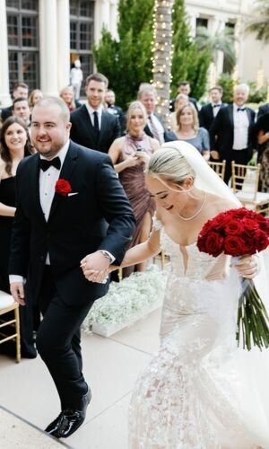 Beautiful couple walking up the steps at The Breakers, captured by Claudia Amalia, Miami wedding photographer