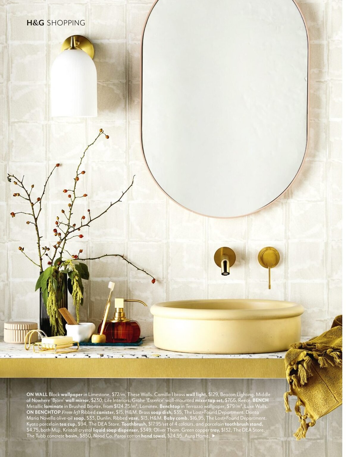Modern Golden bathroom setting for Lisa Hunter Design in a magazine spread in Melbourne