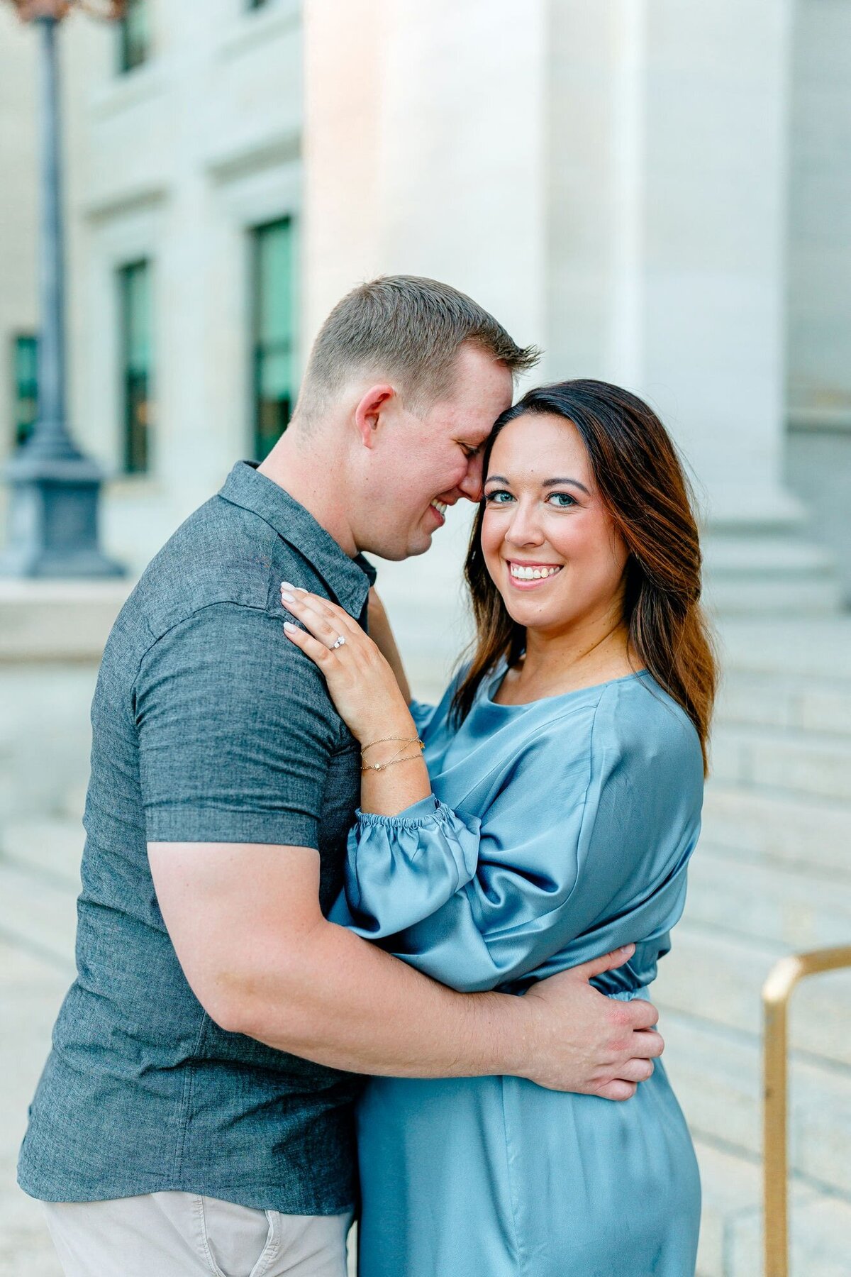 close-up-couple-stairs-engagement