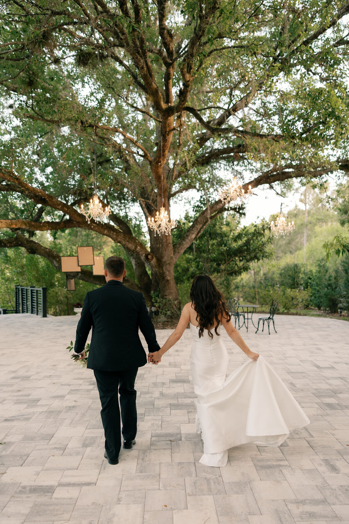 candid walking away at La Casa Toscana Wedding Venue Fort Myers Florida