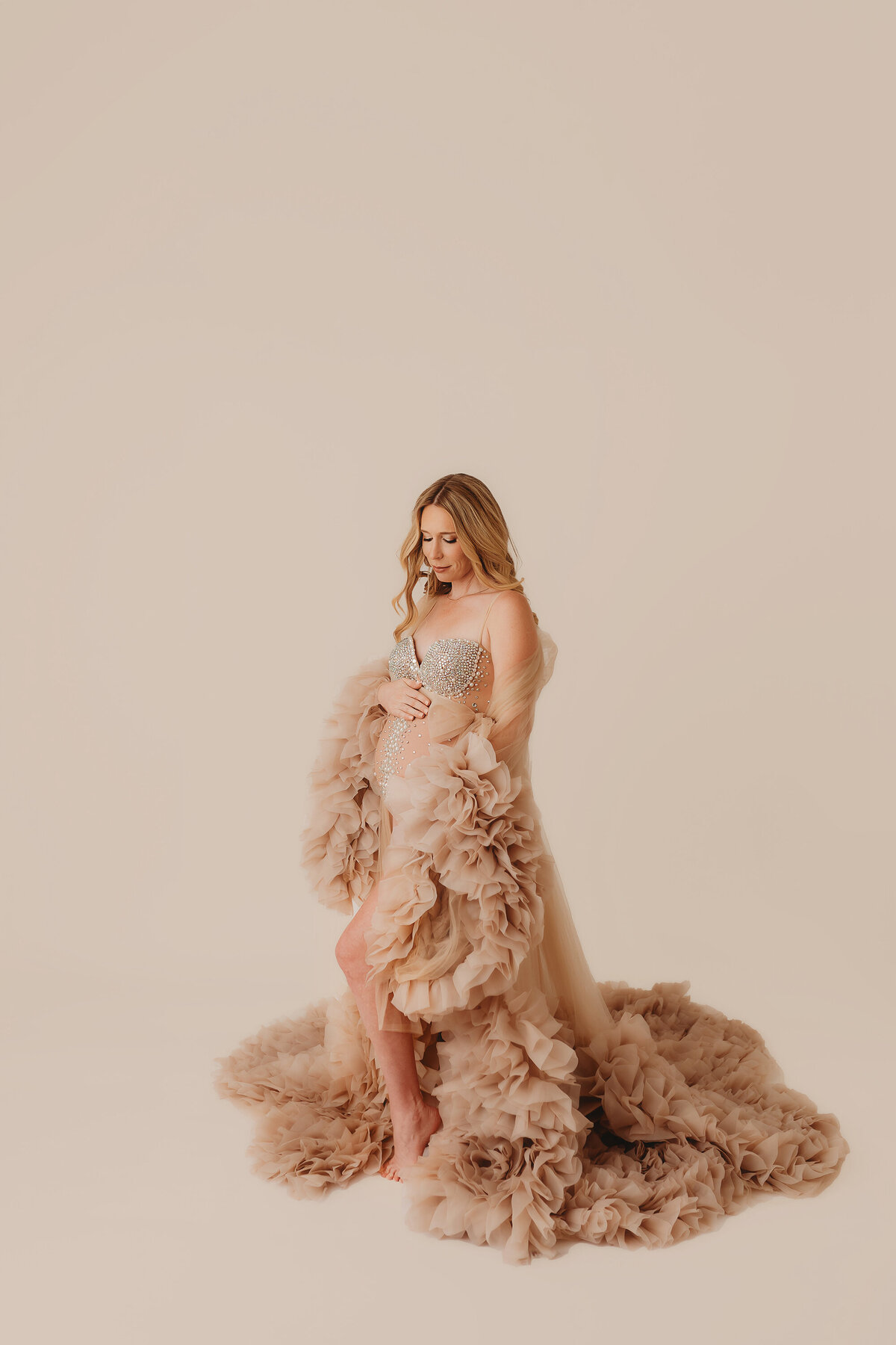 Pregnant mother poses for Maternity Portraits in Charleston, SC. 