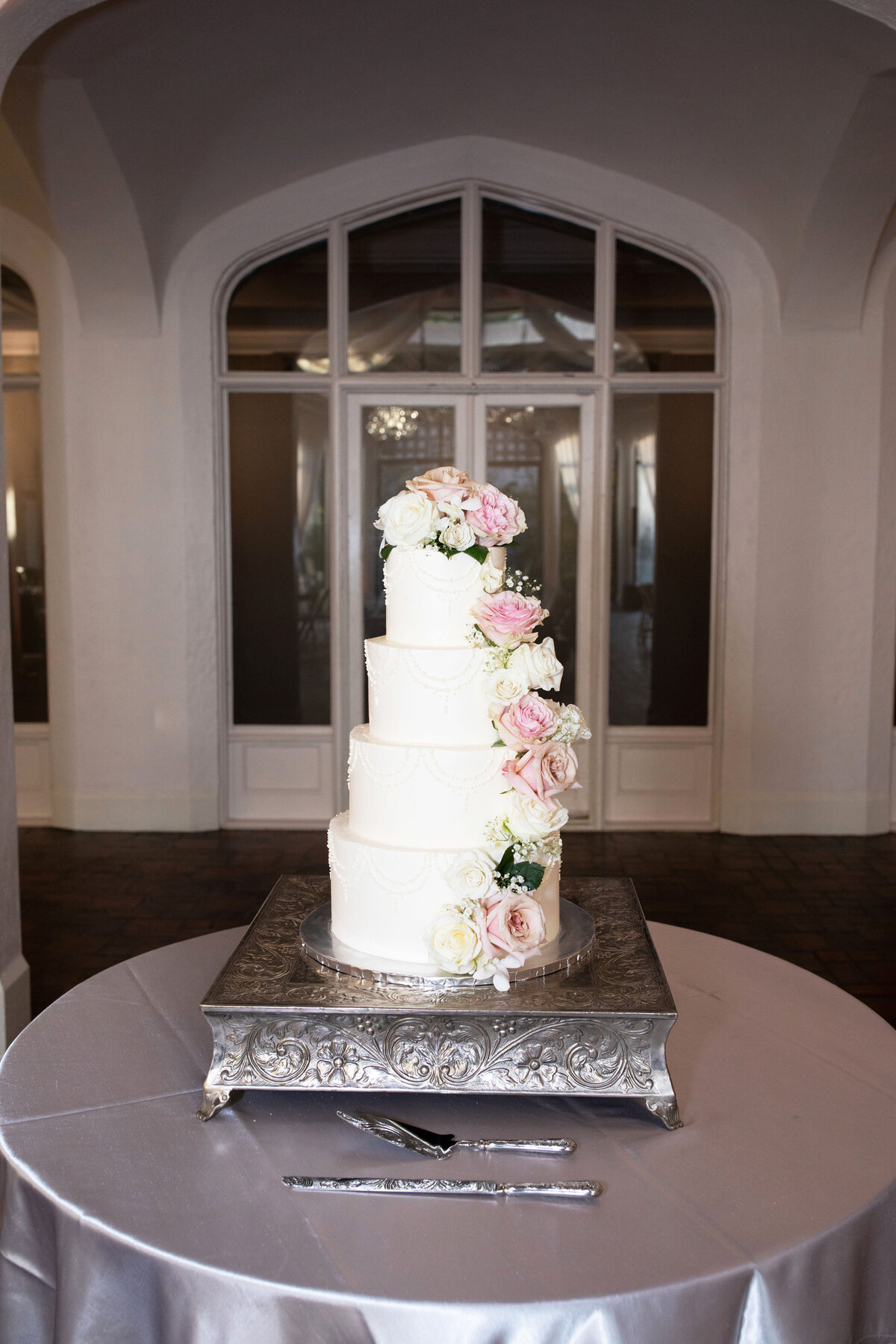four-tier-white-wedding-cake-with-roses-callanwolde-reception