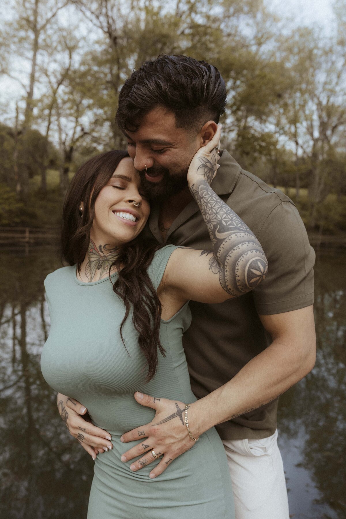 Engagement session on couples private lake dock in Missouri with earthy and creamy colors