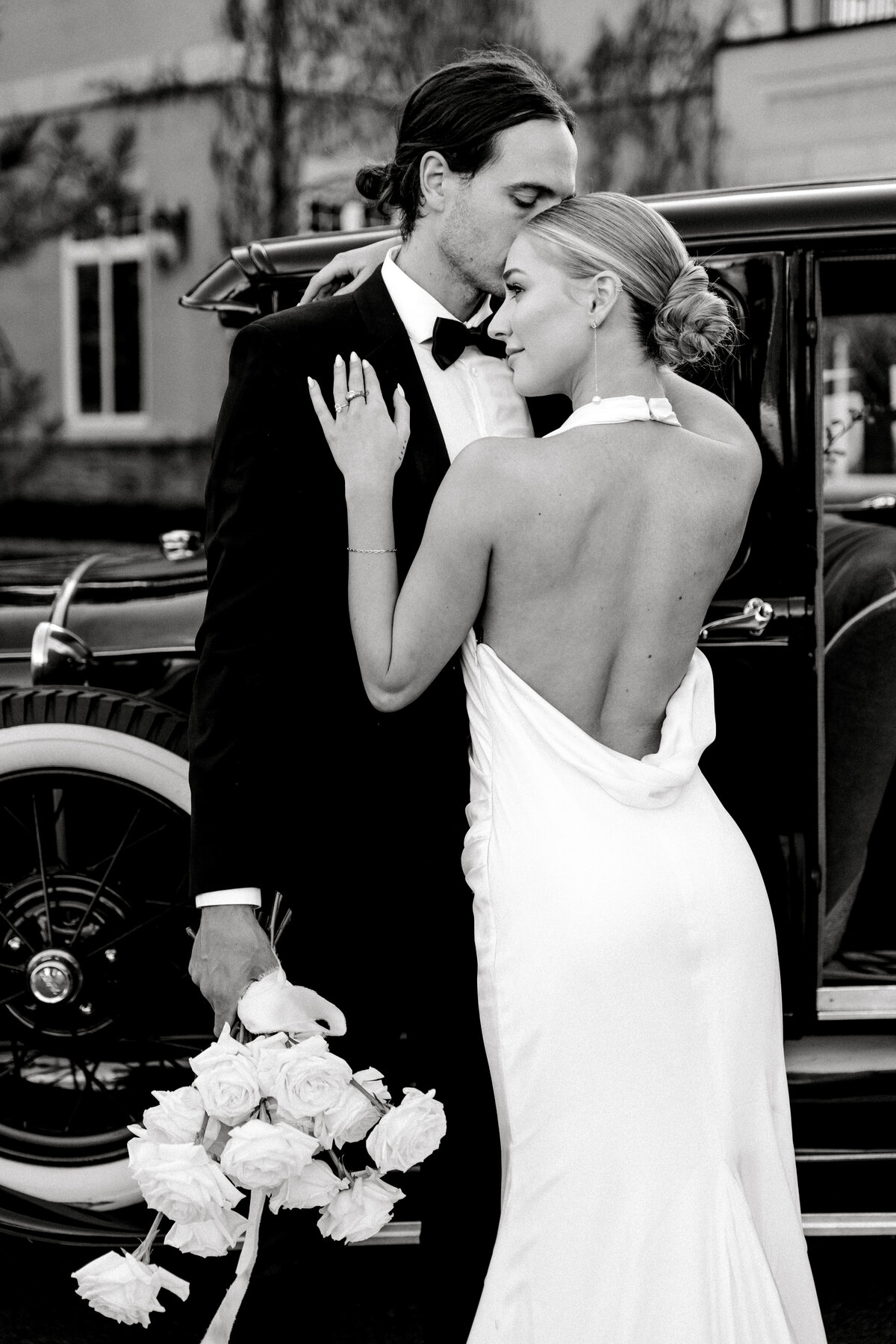 Groom kissing bride