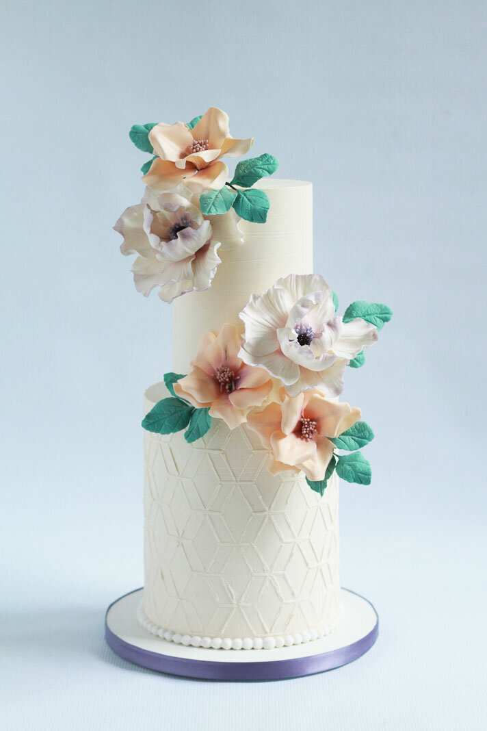 two tier buttercream wedding cake with flowers, Hamilton ON wedding cakes