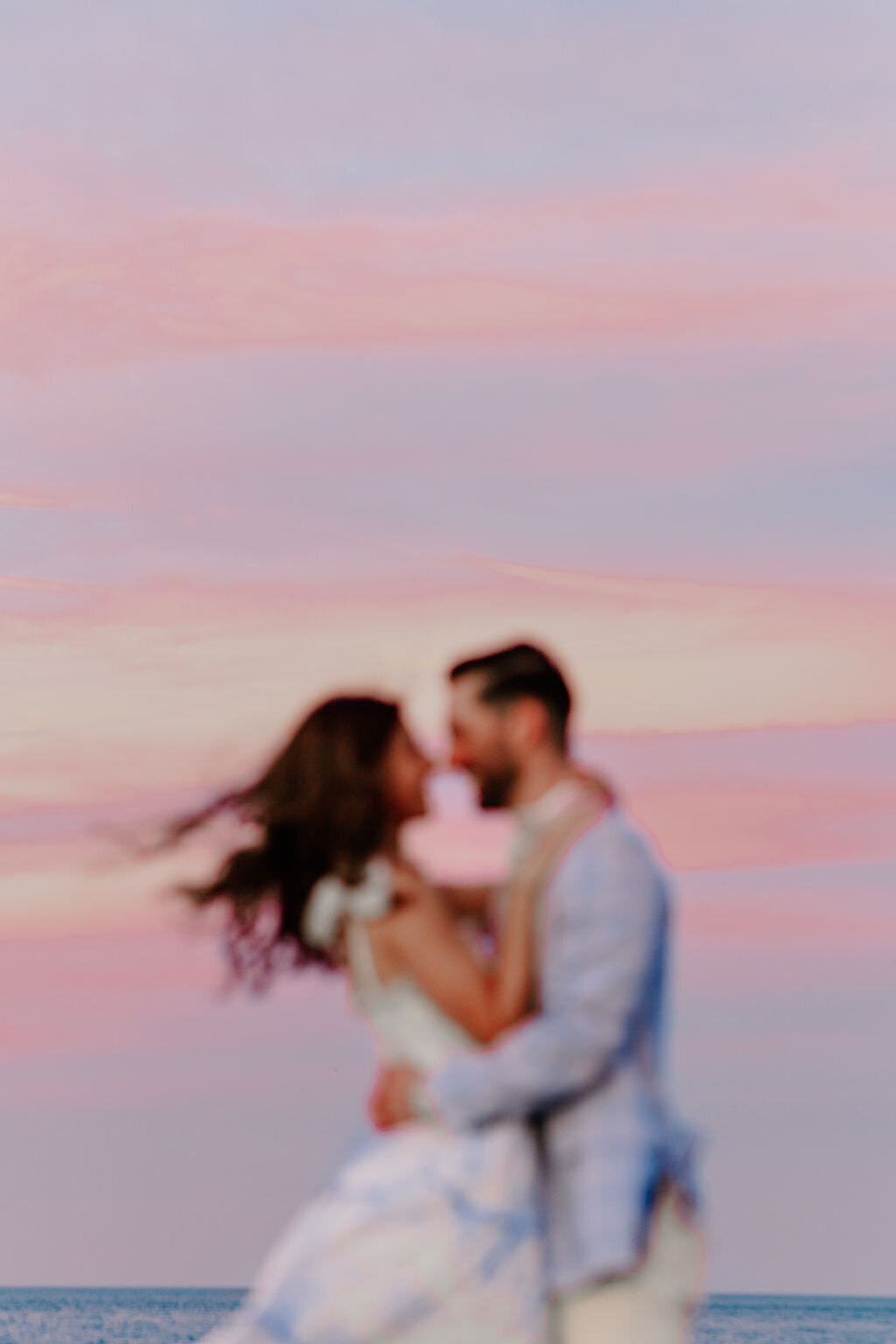 An engagement photography session at The Wrigley Building and North Ave Beach in Chicago, Illinois - 46