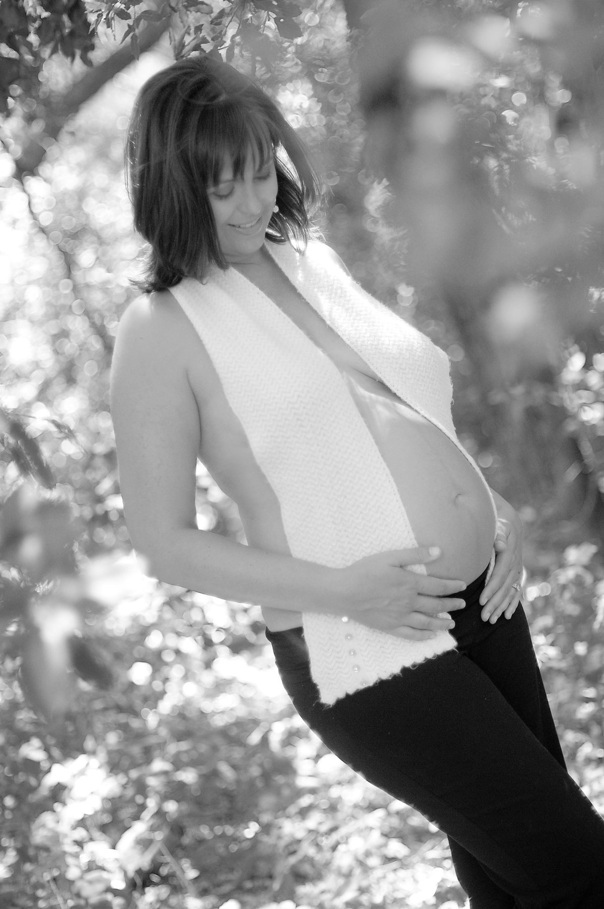 Outdoor Maternity Session Woman Wearing Scarf