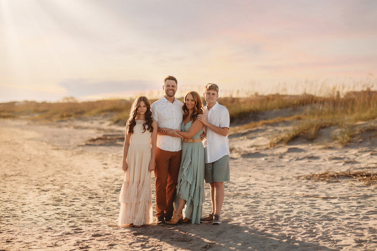Family poses for Family Portraits on Isle of Palms.