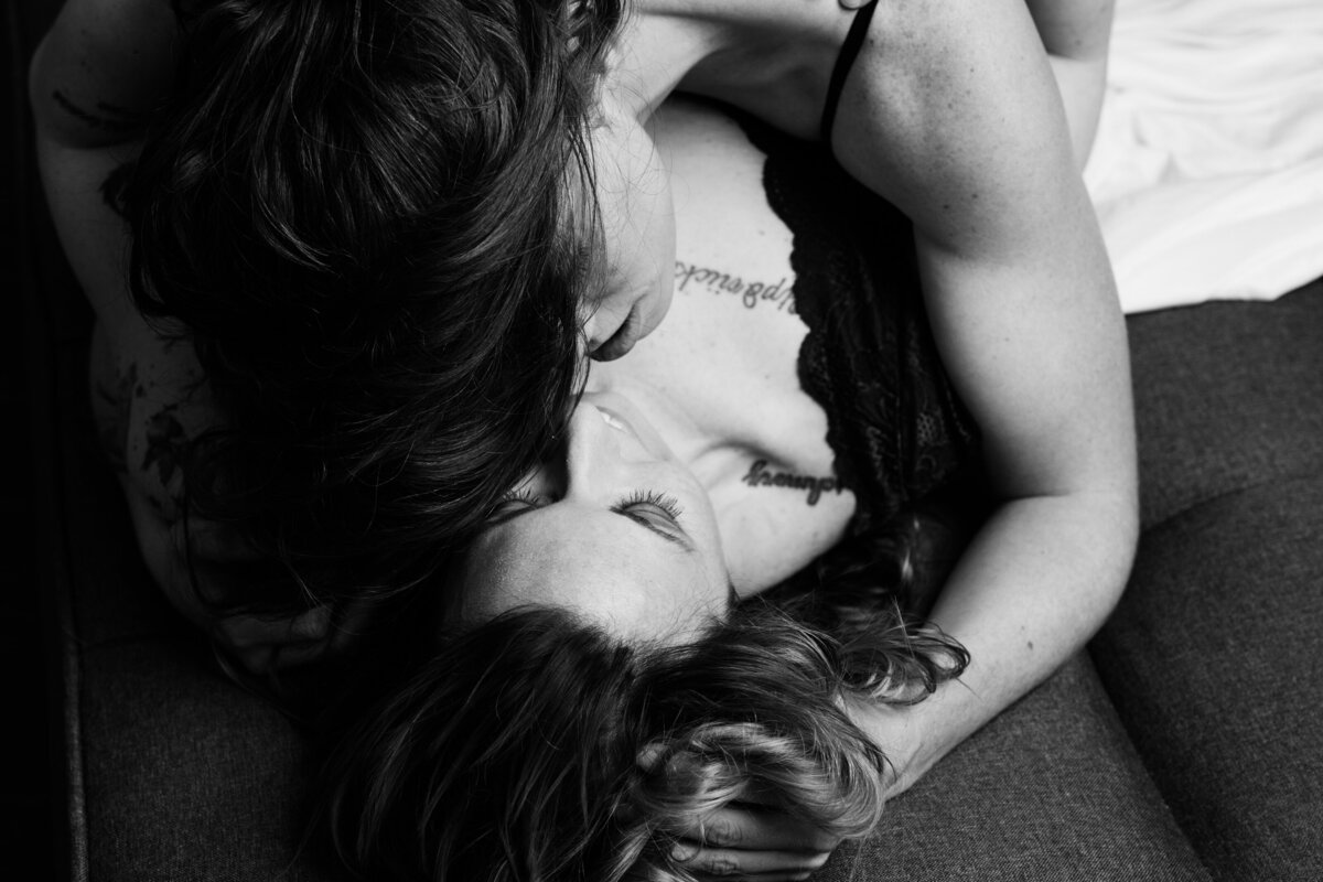 An image of two women in a strong embrace.