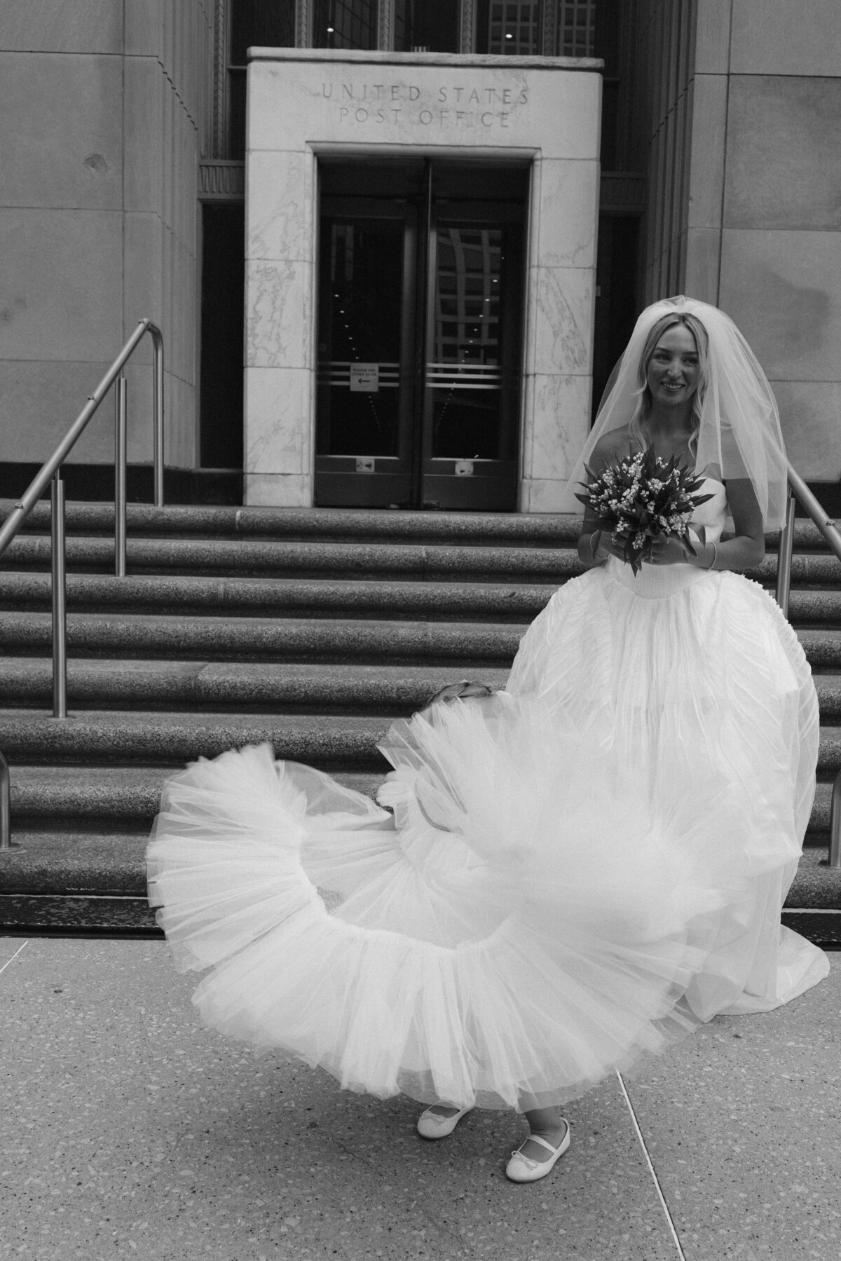 Sophisticated editorial wedding photography showcases ceremony moments at Old Post Office Chicago, featuring Lauren Alatriste's fashion forward approach combining magazine-worthy imagery with architectural beauty and authentic wedding emotion