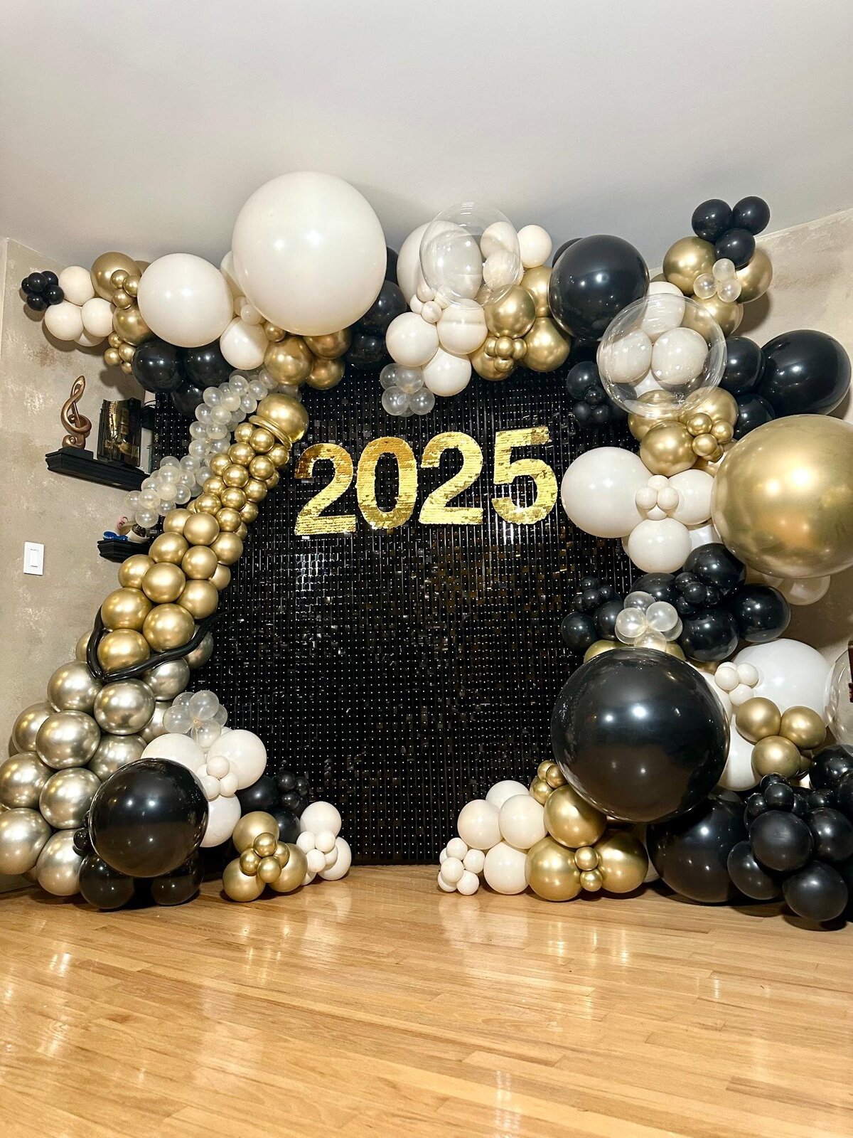 new years balloons and shimmer backdrop