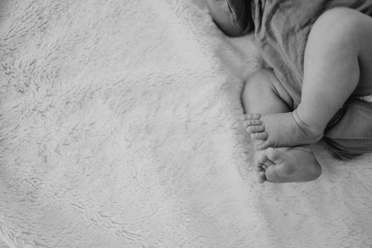 Loveland Newborn Photographer captures baby feet