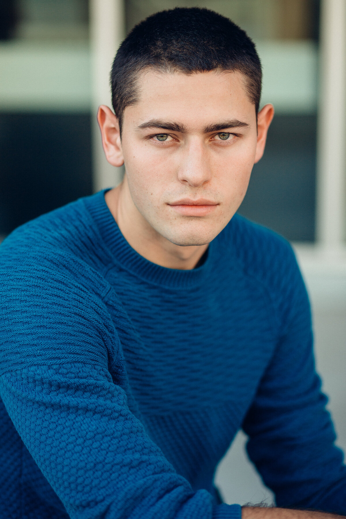 Headshot Photograph Of Young Man In Blue Sweat Shirt Los Angeles