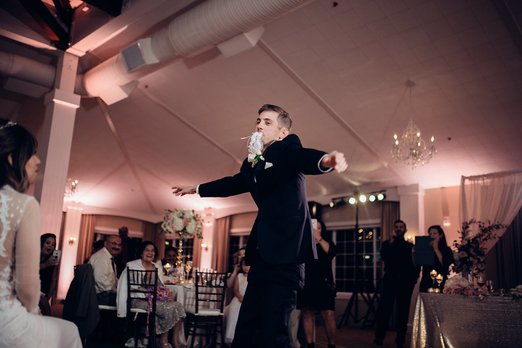 Wedding Photograph Of Groom Raising His Hands While Standing Los Angeles