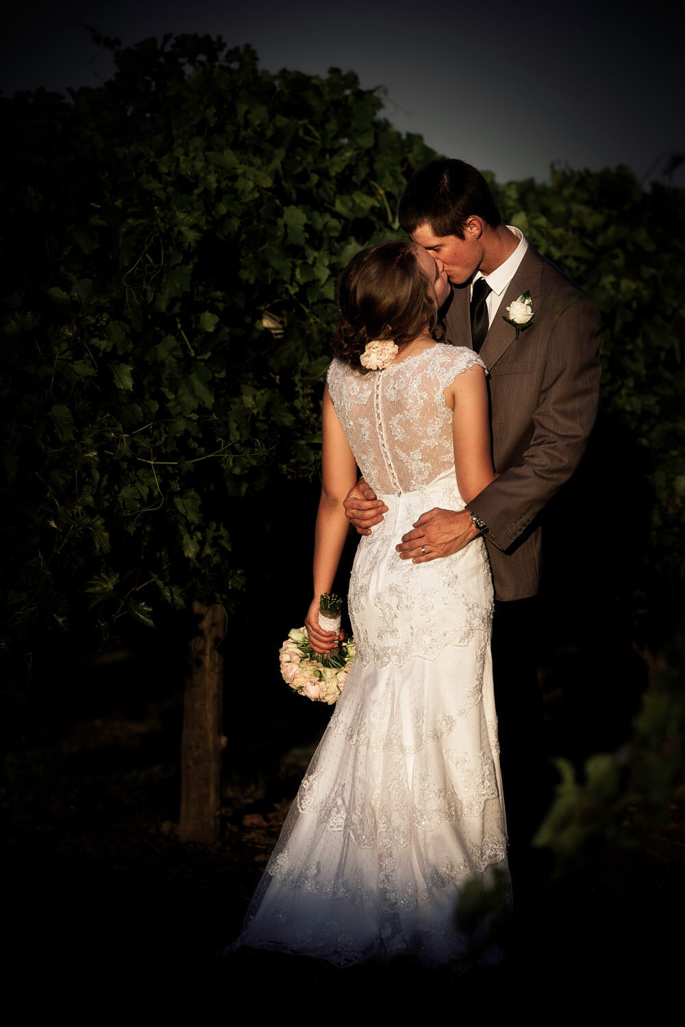 wedding couple in vineyard outside of Emerald, QLD