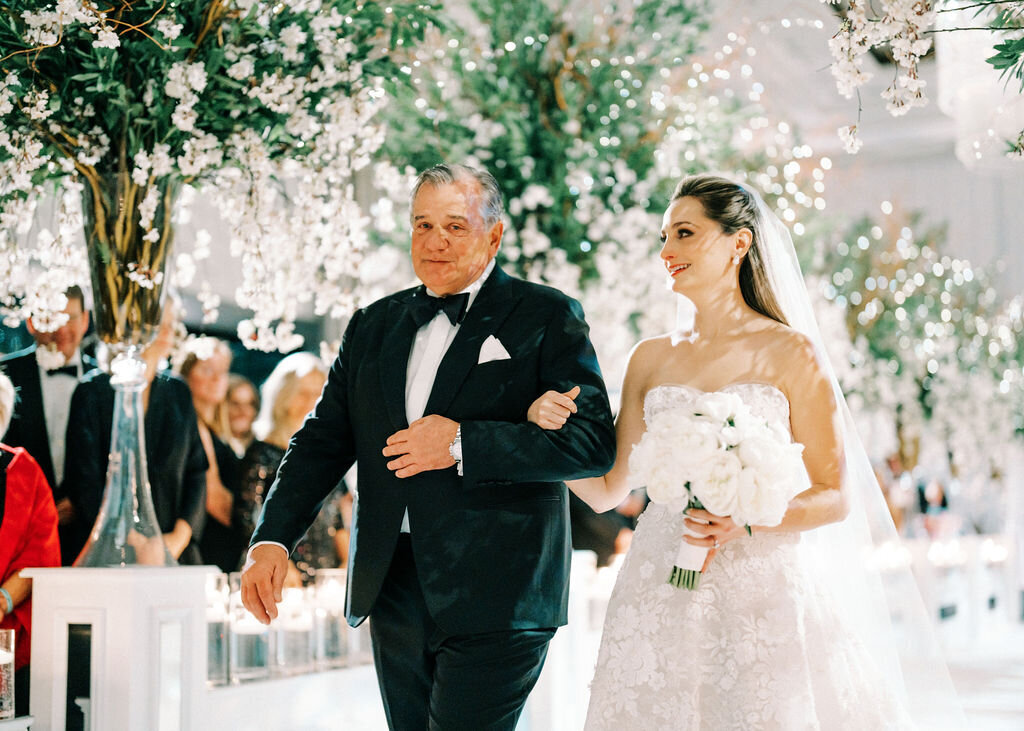 Close up of the father of the bride with his daughter. 