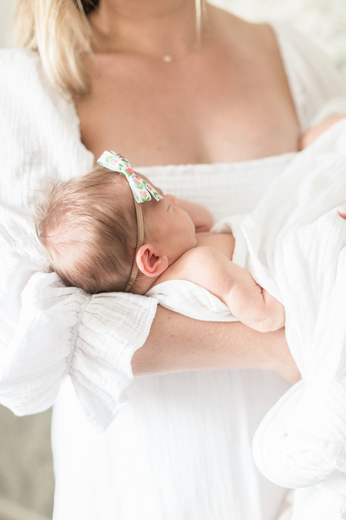 Mom holding her newborn baby
