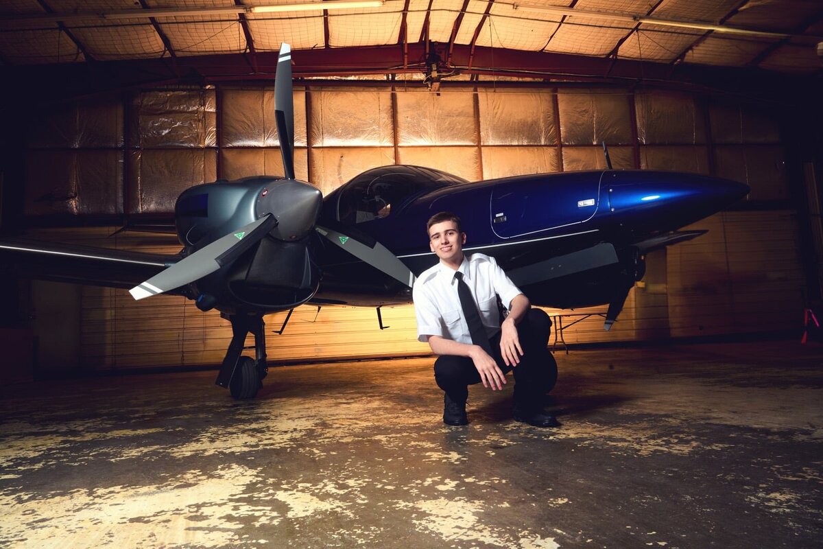 High School Senior Portrait Photographer With Airplane Concept in Minnesota-36