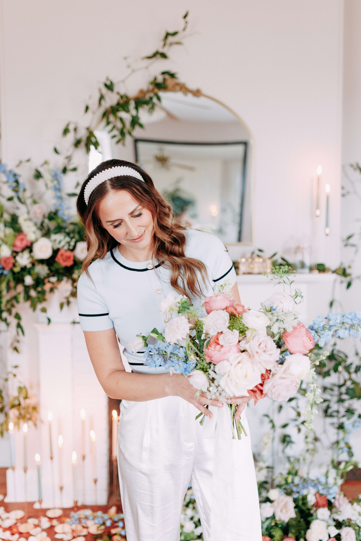 floral designer with bouquet