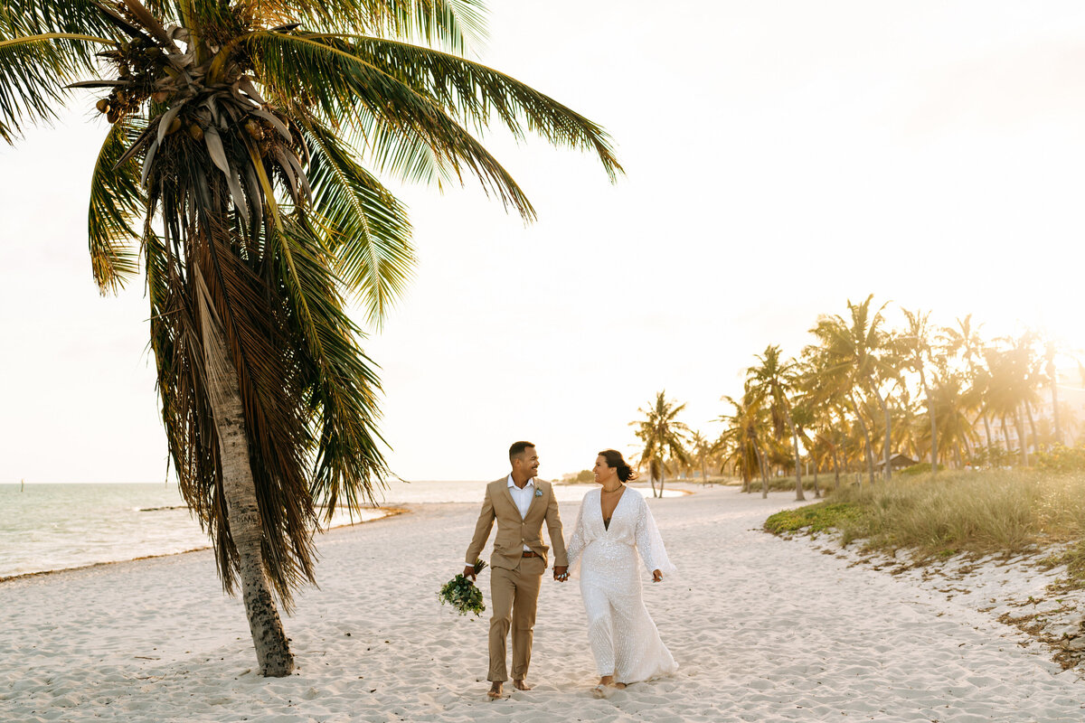 wedding couple walking on key west beach