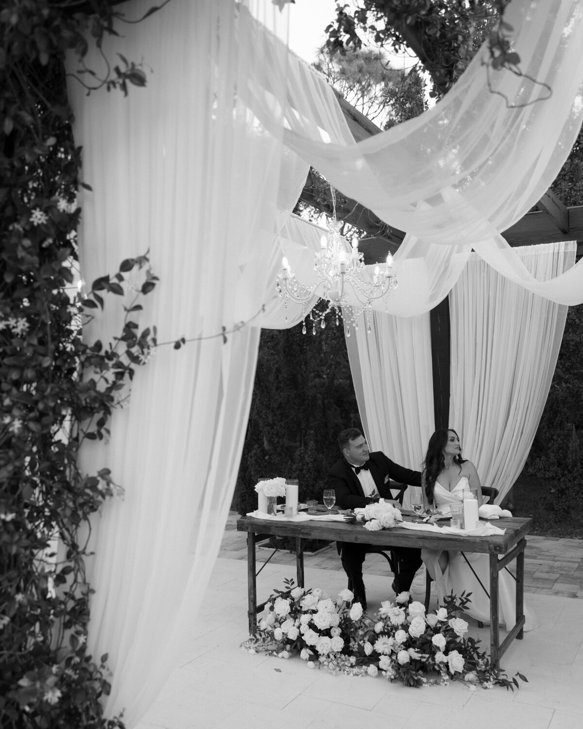 bride and groom react to guest speeches at La Casa Toscana Wedding Venue Fort Myers Florida
