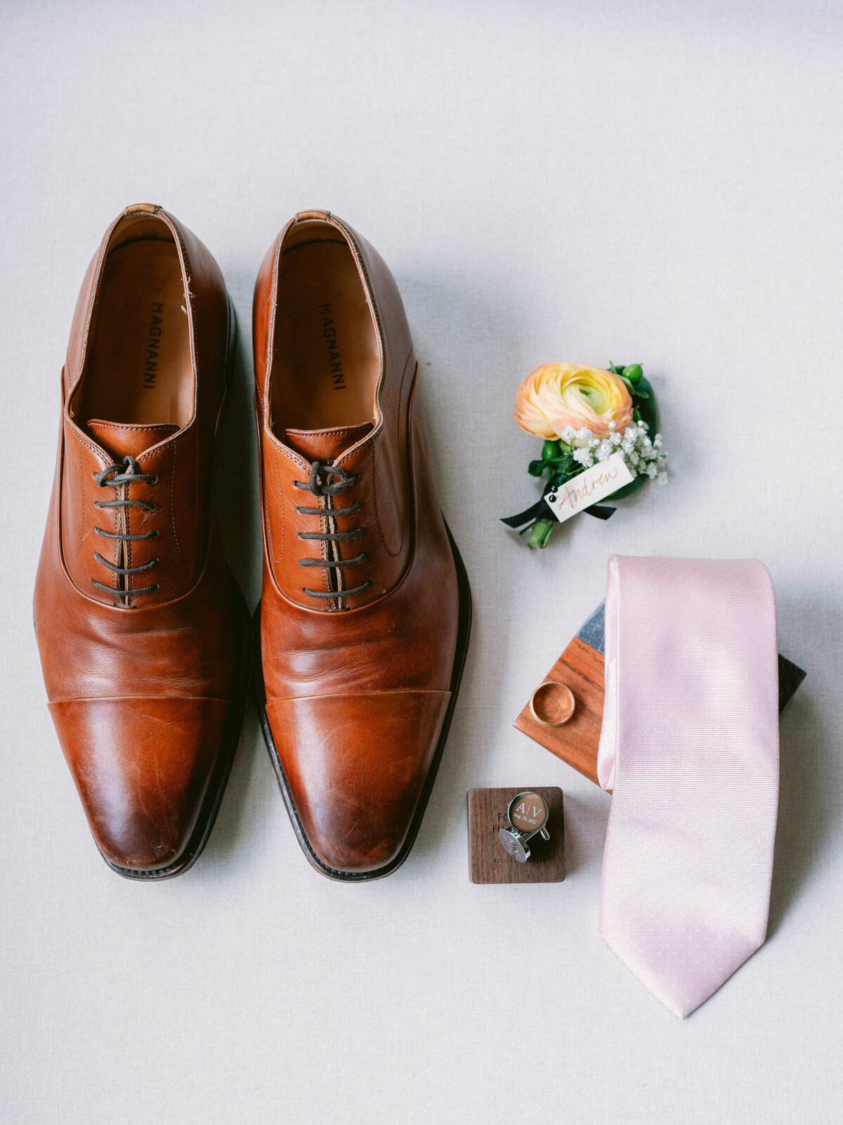 Grooms shoes, tie, rings and florals for wedding at The Grand Lady Austin