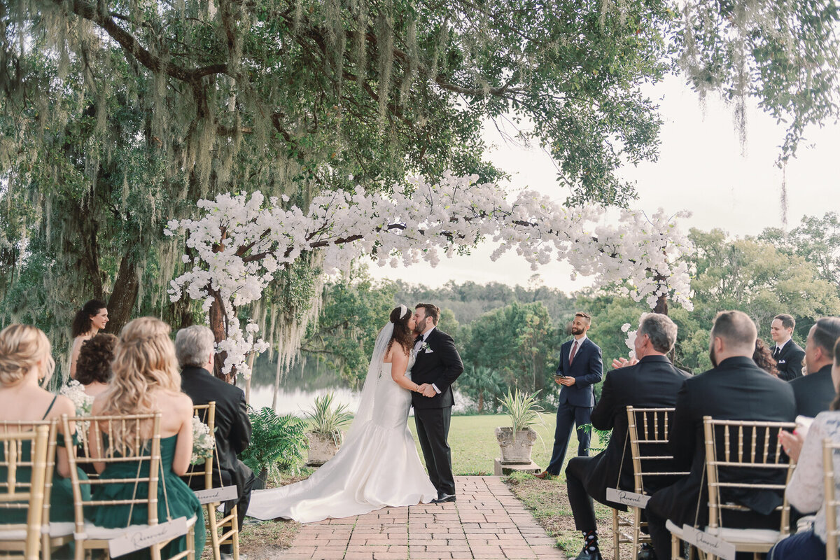 White floral wedding at Sydonie Mansion  captured by Orlando Wedding Photographer