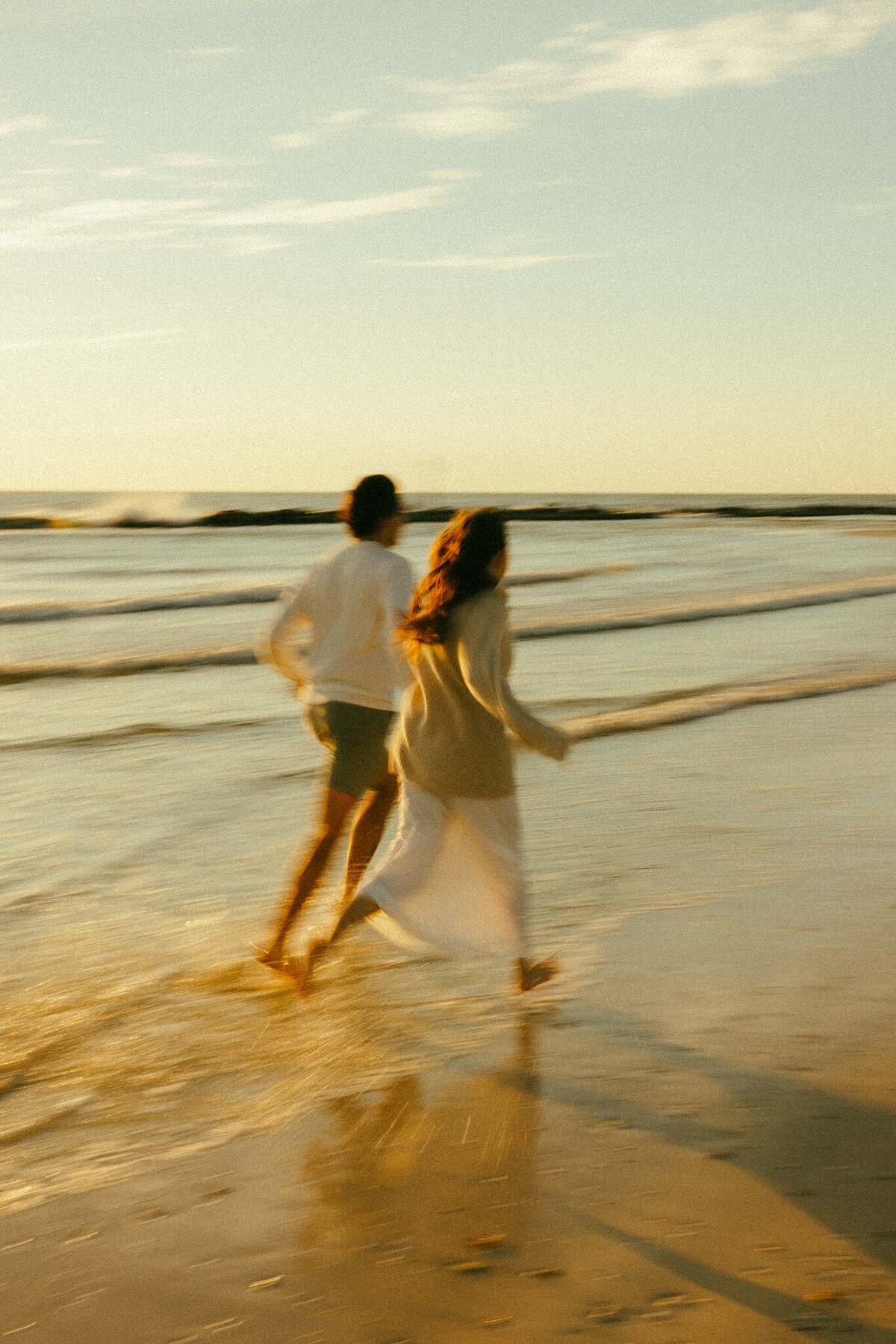 Brooke-John-Oasis-Beach-Honeymoon-Island-State-Park-engagement-session-maternity-session-couple-beach-Florida-sierra-does-photos-33