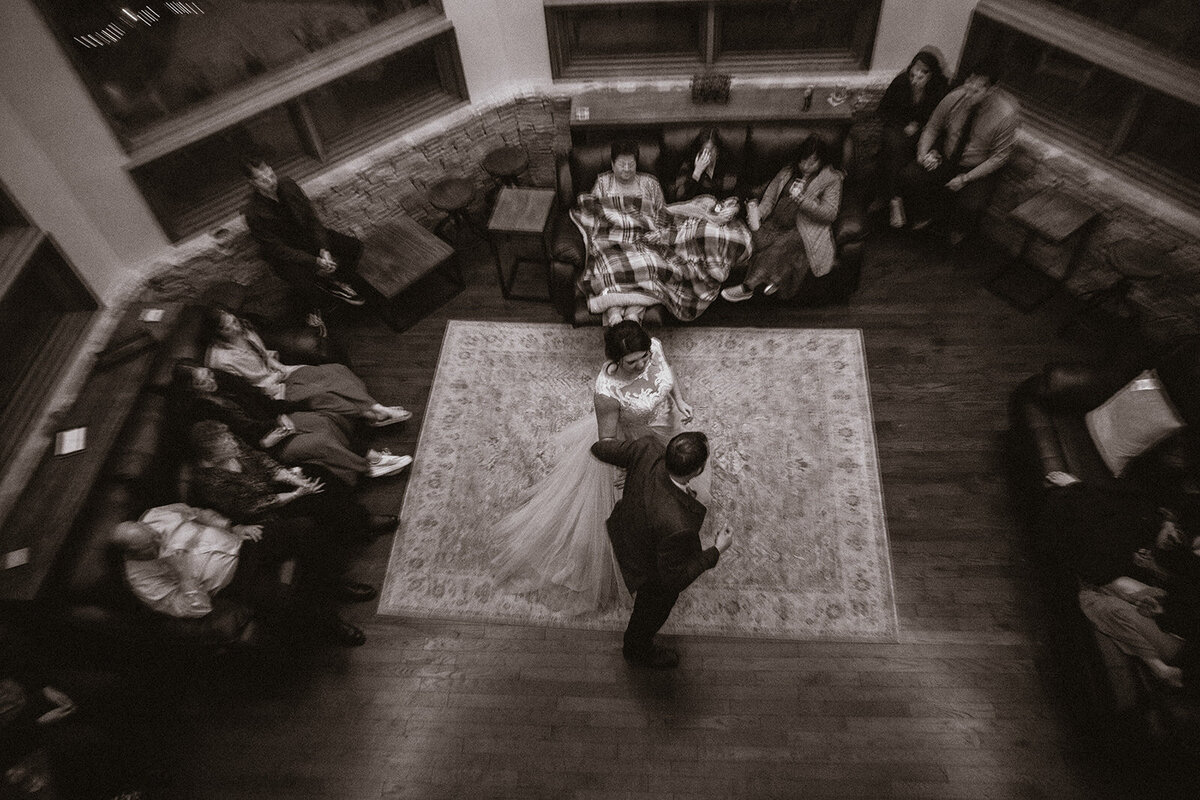 bride and groom share first dance inside cabin in tennessee