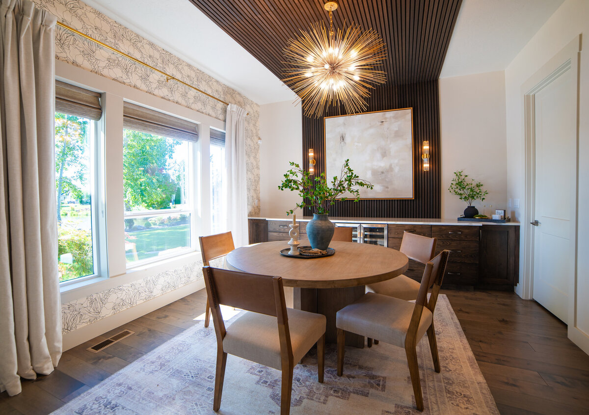 luxury great room with two white sofas fire place gold coffee table