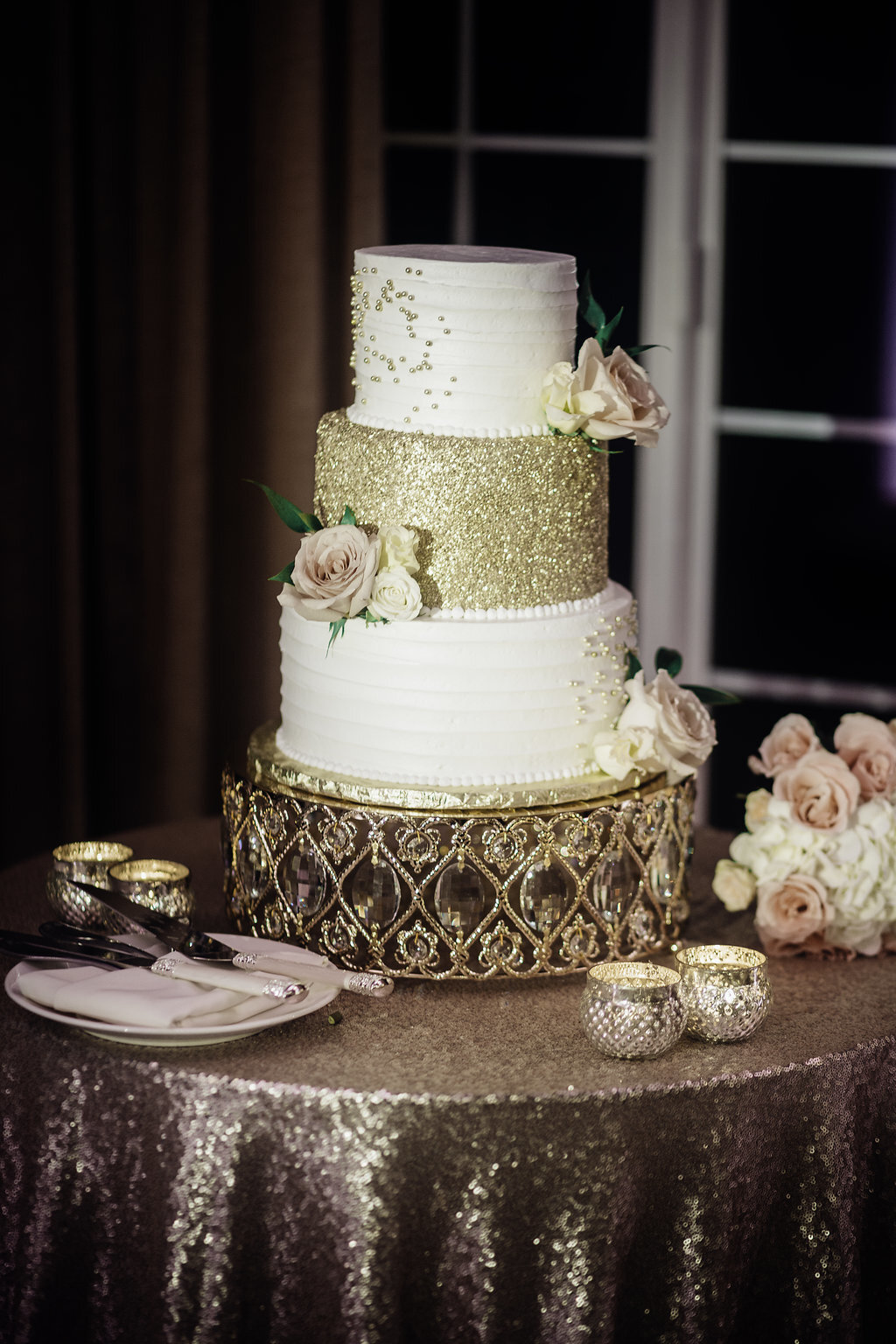 Wedding Photograph Of Cake Decorated With Roses Los Angeles