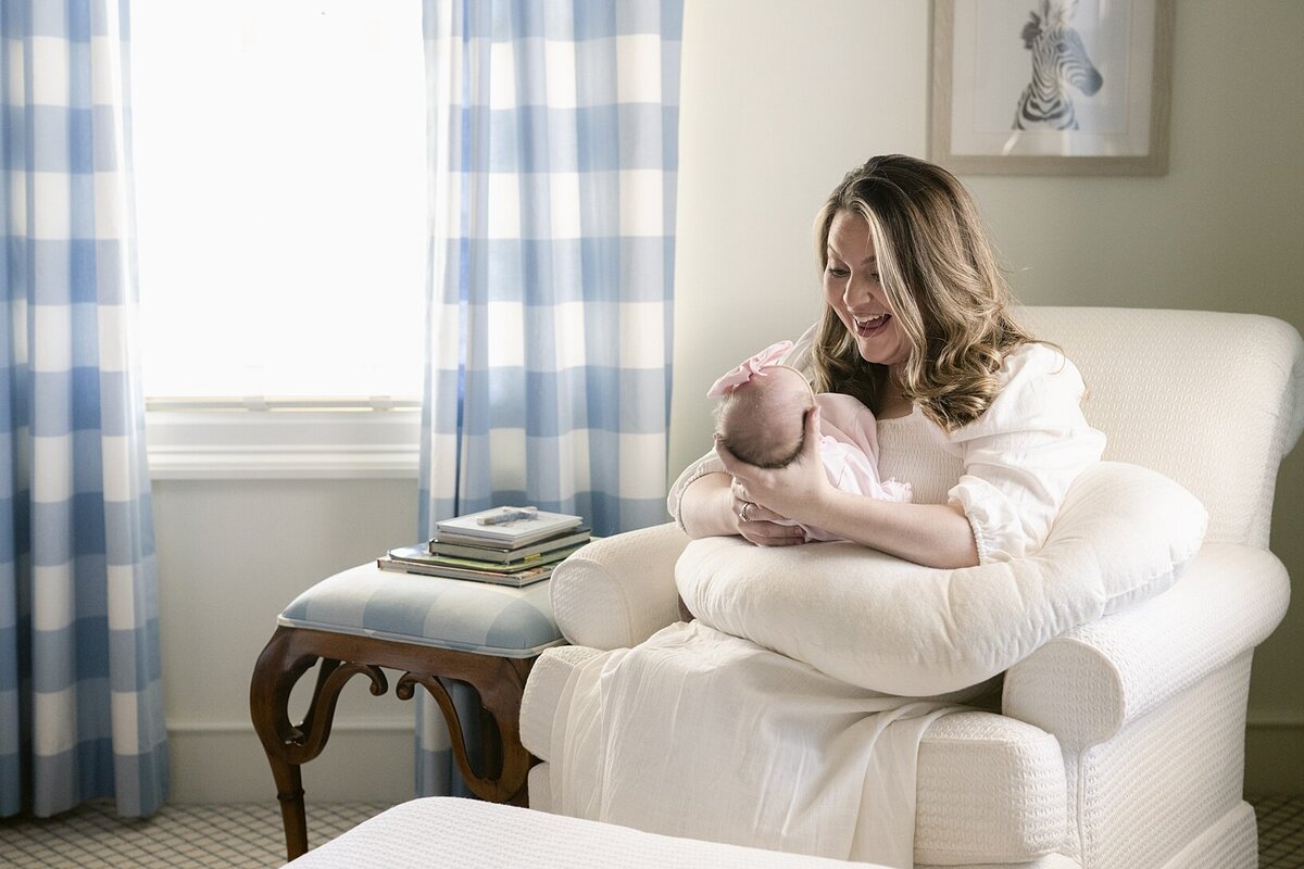 Mom with her baby at a nuangel shoot