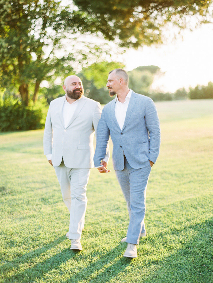 two grooms at a wedding
