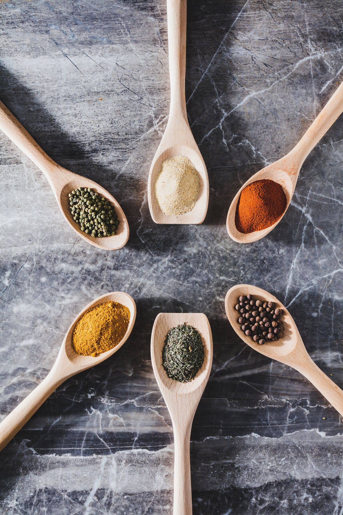 six-wooden-spoons-with-different-seasonings-2022-12-16-11-02-10-utc