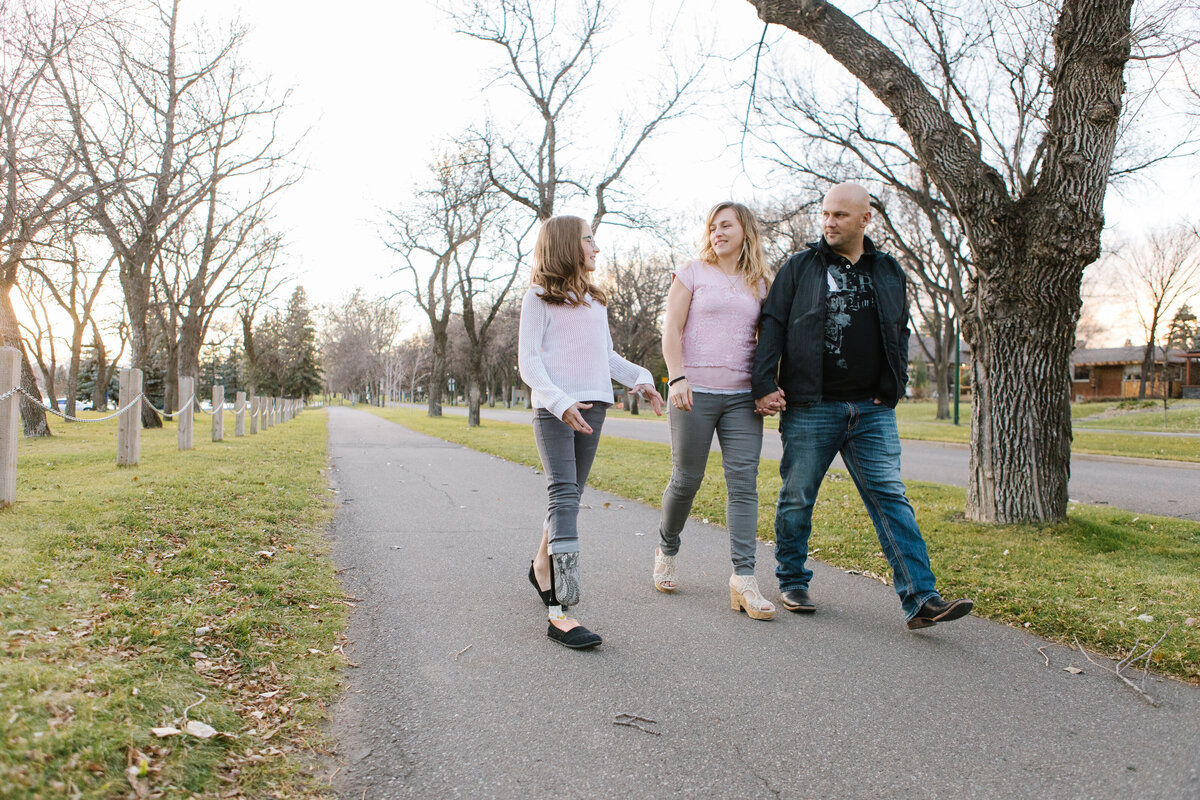 A man running in the park while wearing a high-performance knee brace.