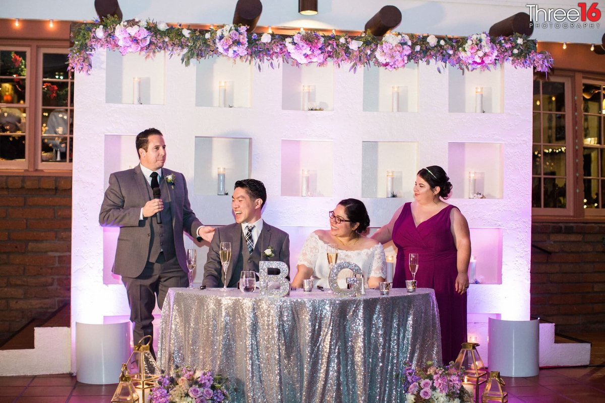 Best Man gives a toast to the newly married couple