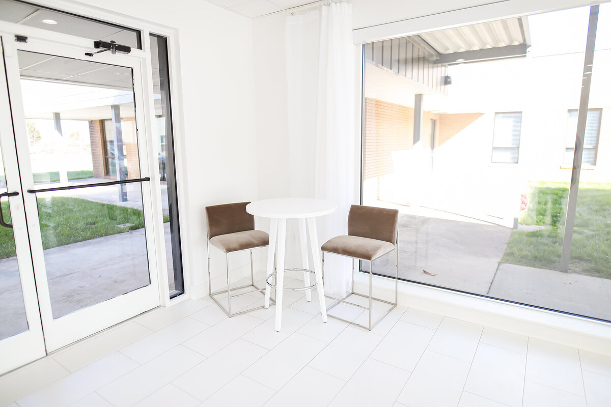 Chairs and table with windows