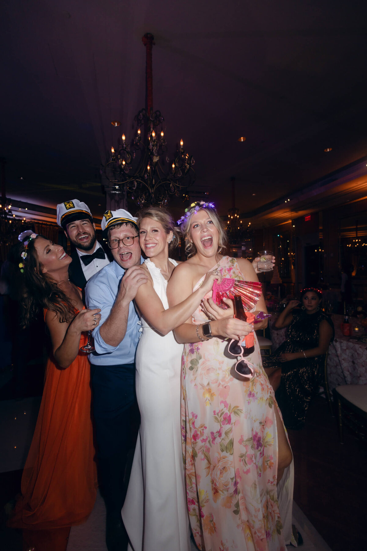 A wedding photo of guests at the wedding reception