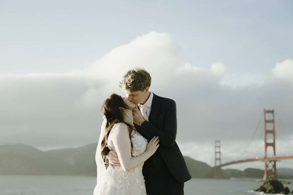 Bride and Groom at Marshall's Beach in San Francisco, California at sunset