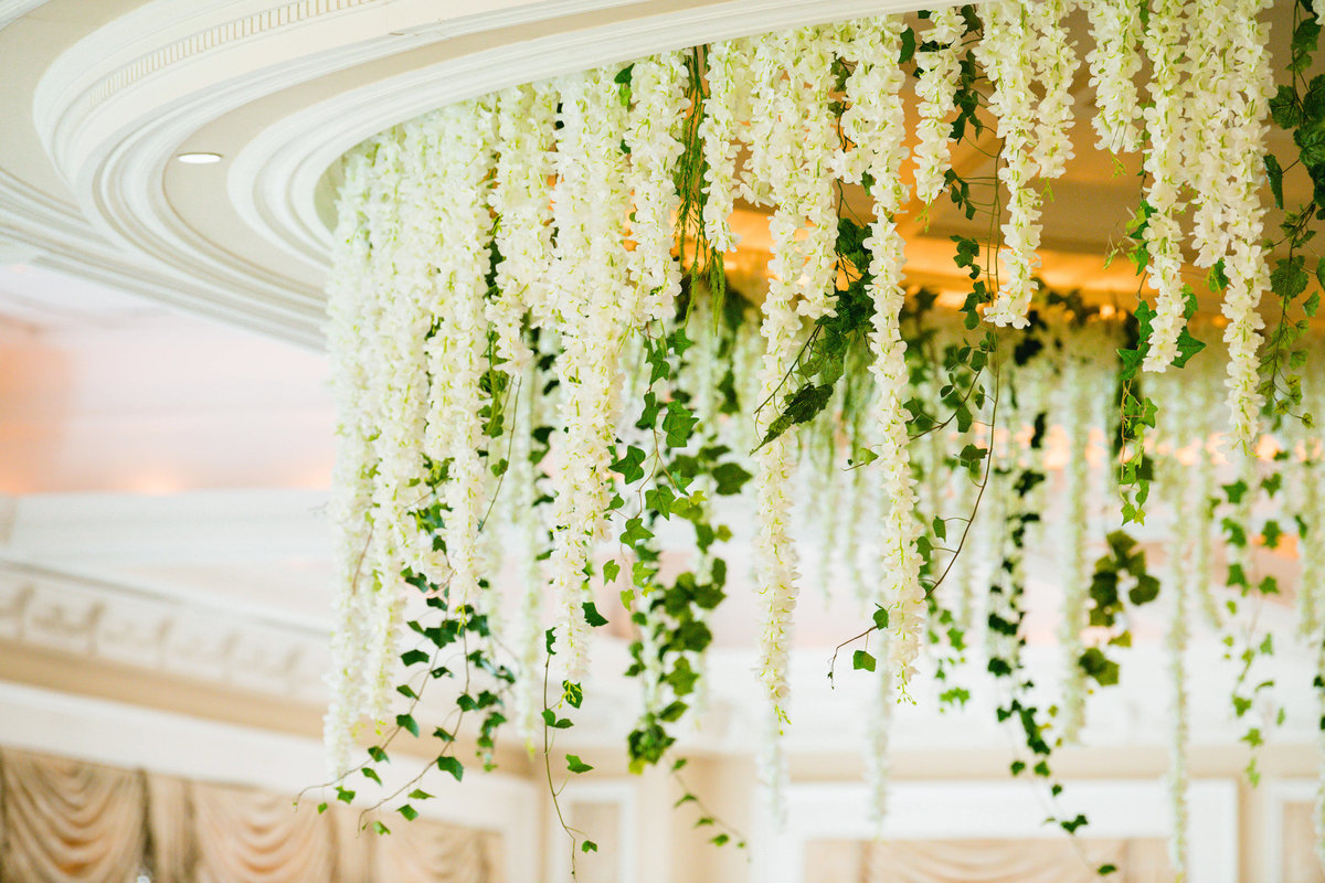 flowers hanging from ceiling  for wedding at The Muttontown Club