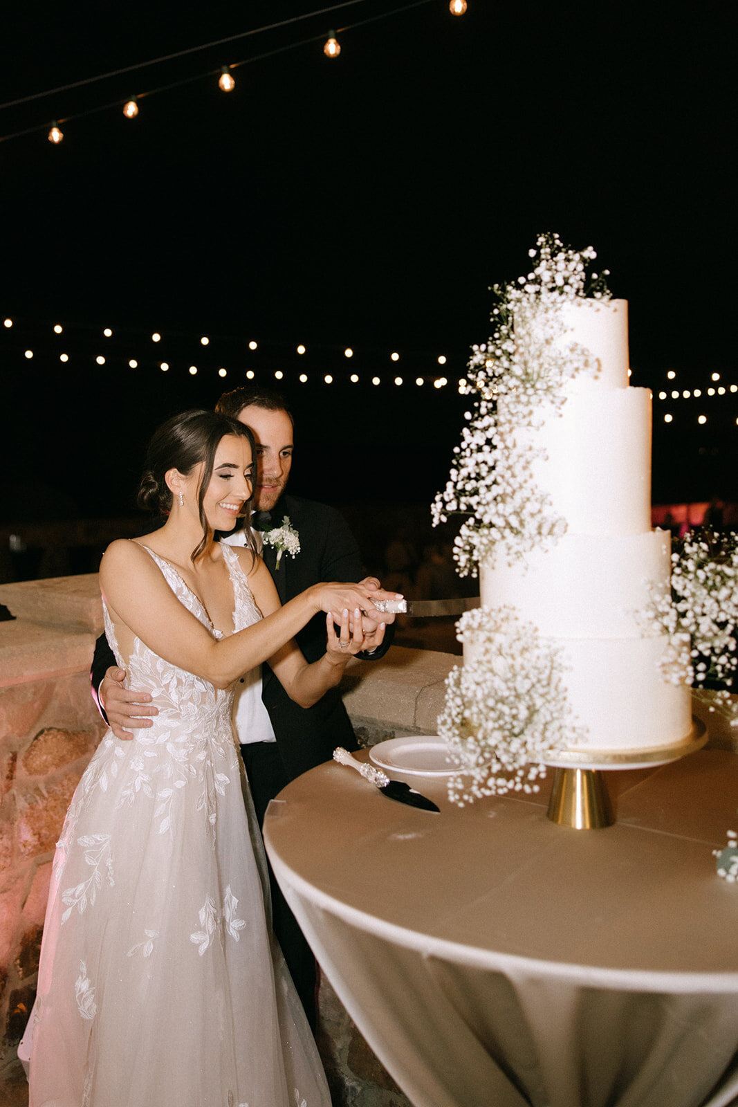 cake cutting at bella collina wedding venue​