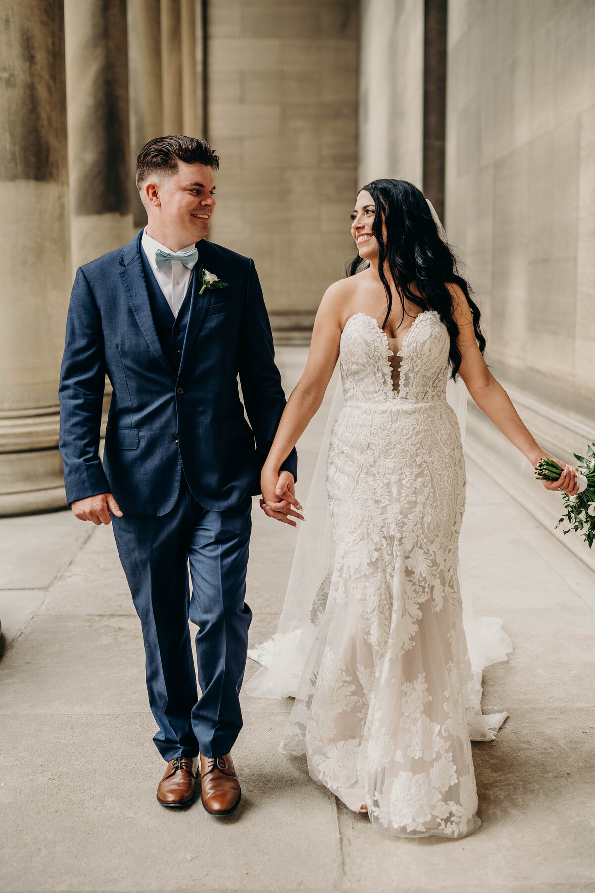 Bride and groom walking hand-in-hand down a romantic path, creating memories that will last forever | Pittsburgh Wedding Photography