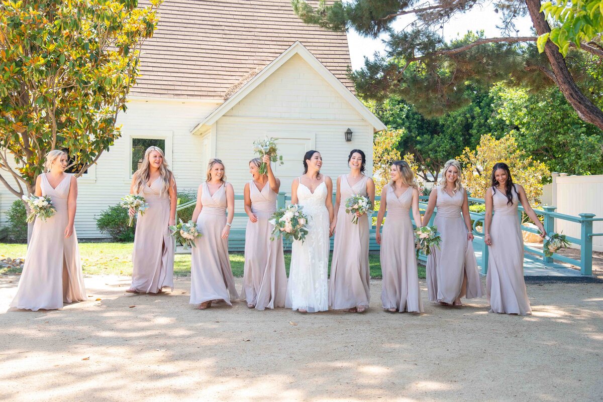 Maria-McCarthy-Photography-wedding-bridesmaids-laughing-walking