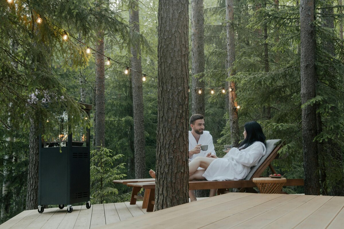 couple enjoying spa in the forest