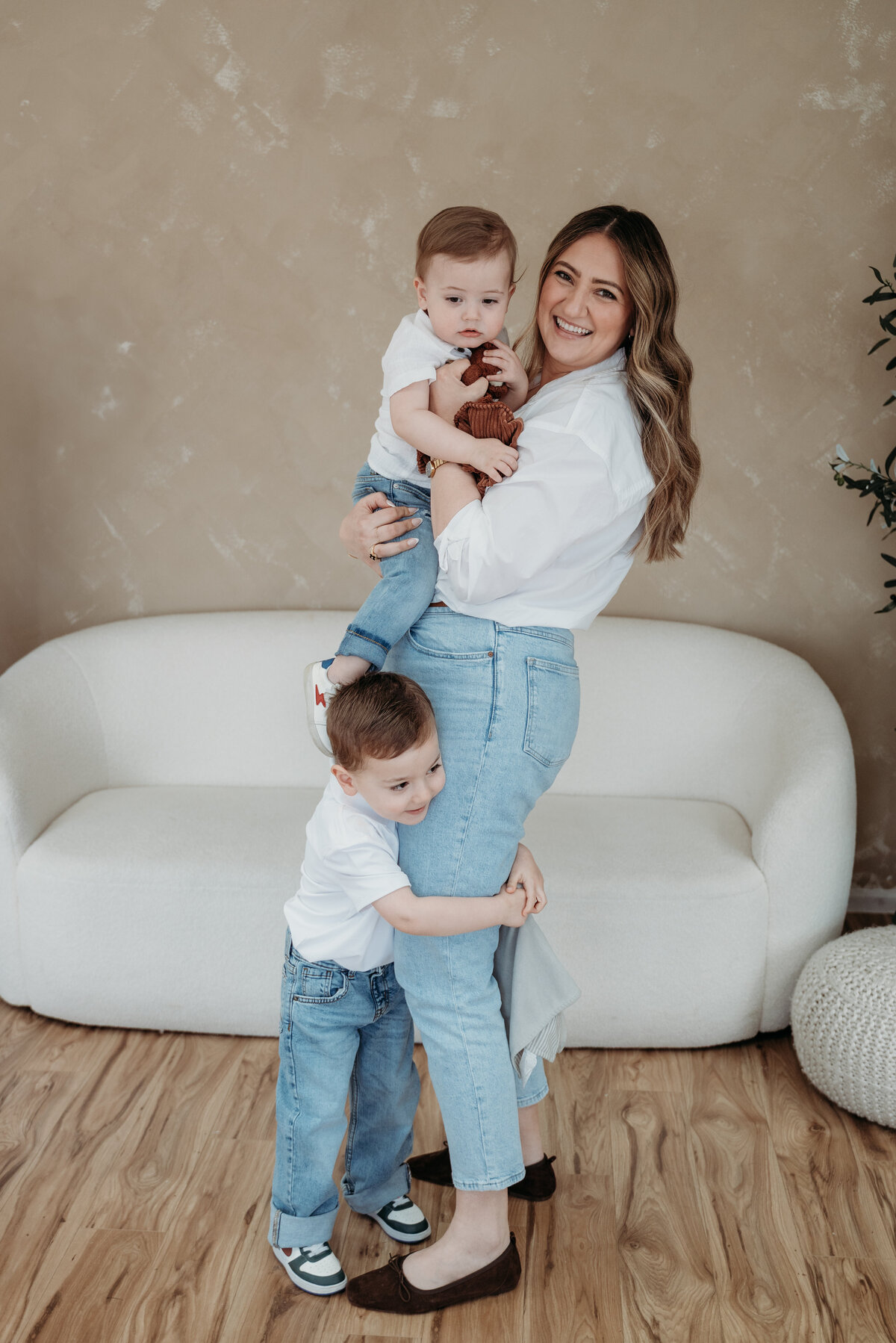 Boy mom playing with her sons during a photoshoot, Wheaton, IL