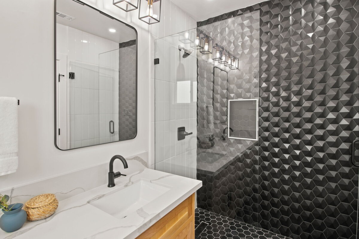 textured-black-tile-shower-wall-modern-bathroom