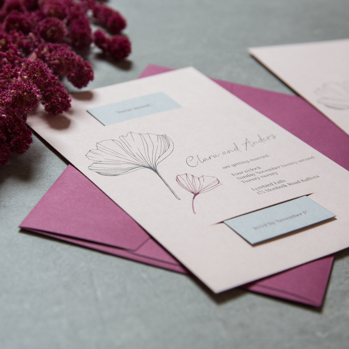 Pink wedding invitation with ginkgo leak design and grey rsvp card and purple envelope